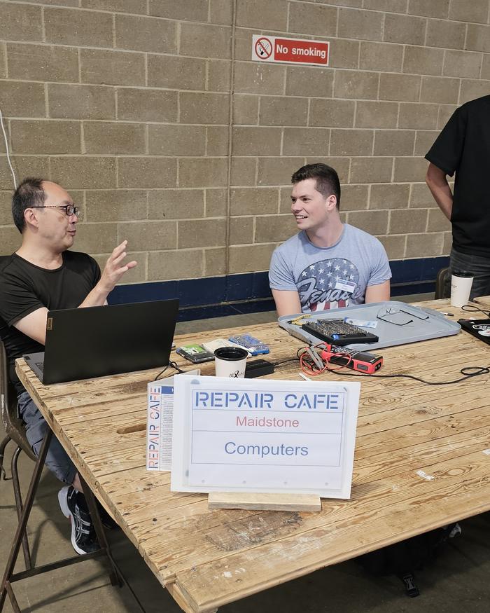 Volunteers at the Computers repair table