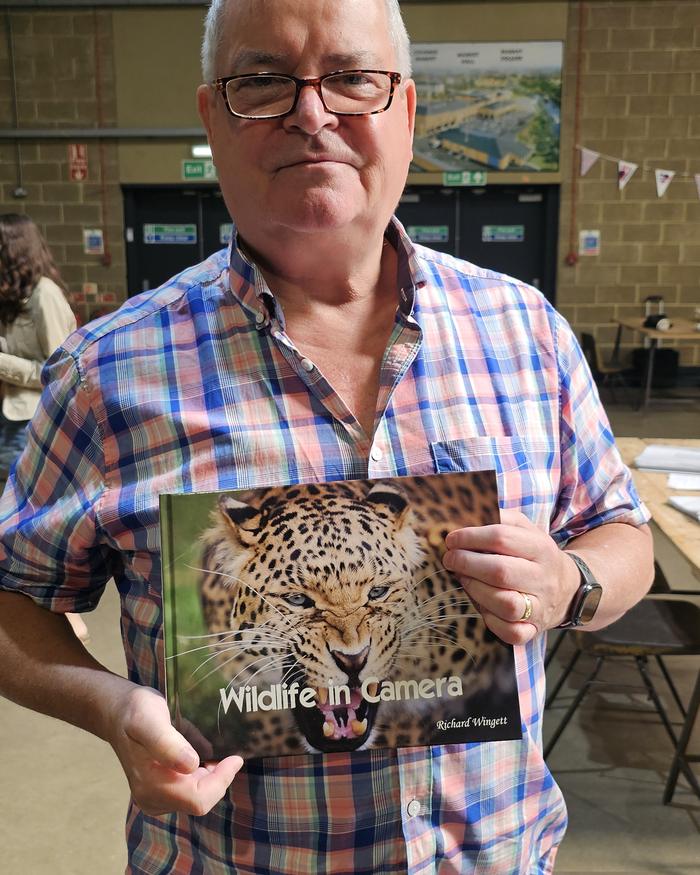 Local wildlife photographer with his book Wildlife in Camera